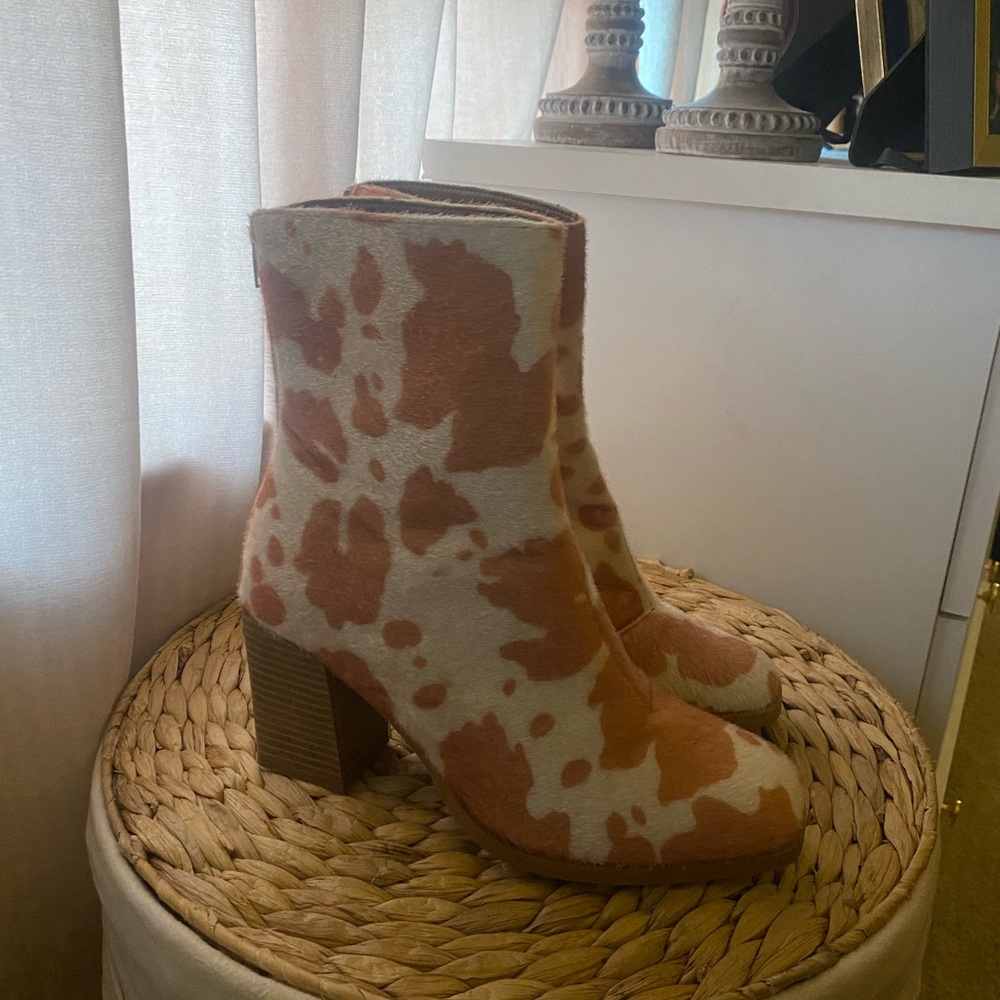 Cow print ankle booties